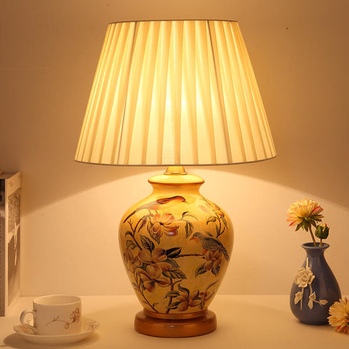 Contemporary Ceramic 1-Light Table Lamp - Warm Cylindrical Design