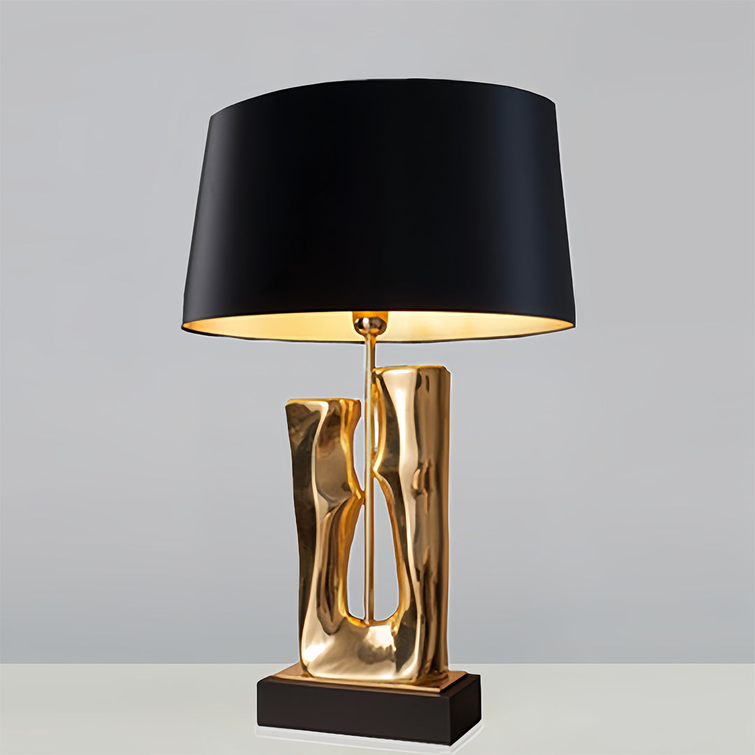 Elegant Gold and Black Sculptural Table Lamp with Drum Shade