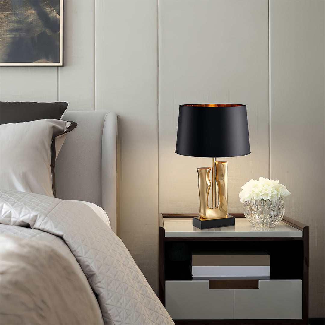 Elegant Gold and Black Sculptural Table Lamp with Drum Shade