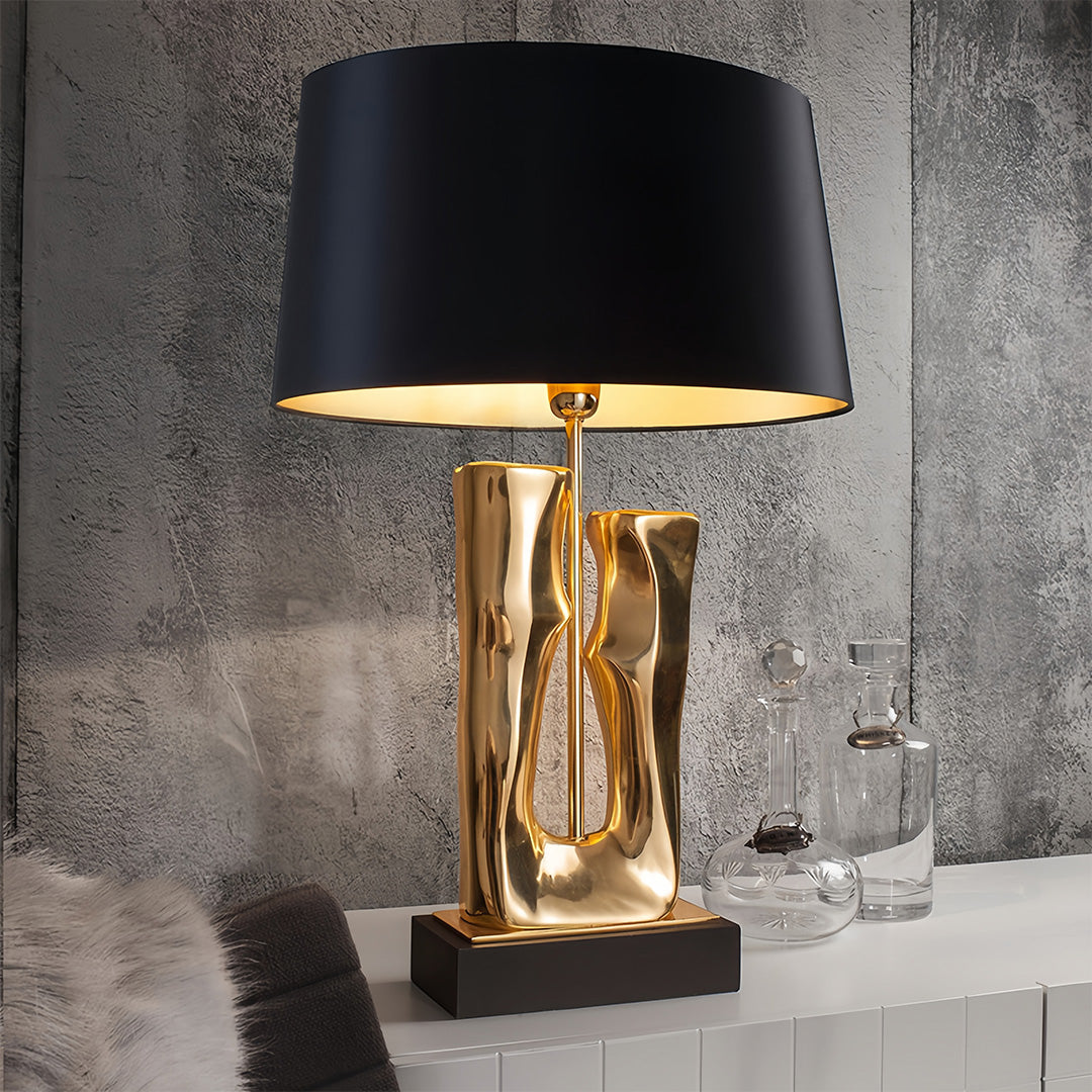 Elegant Gold and Black Sculptural Table Lamp with Drum Shade
