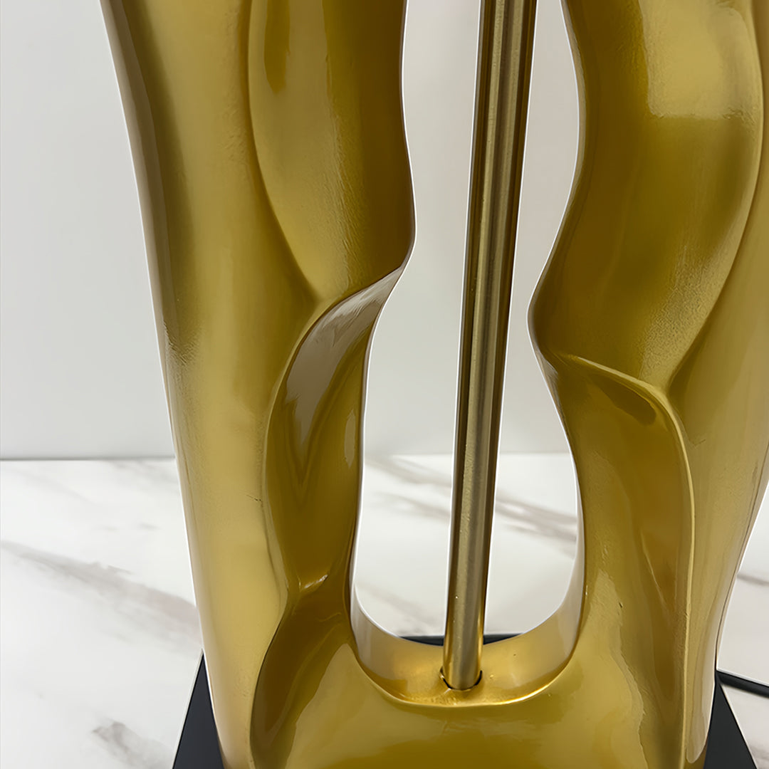 Elegant Gold and Black Sculptural Table Lamp with Drum Shade