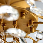 Modern Brass Leaf Chandelier with Crystal Accents