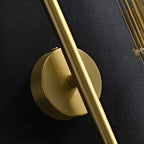 Elegant 4-Light Oval Brass Wall Sconce with Clear Glass Shade