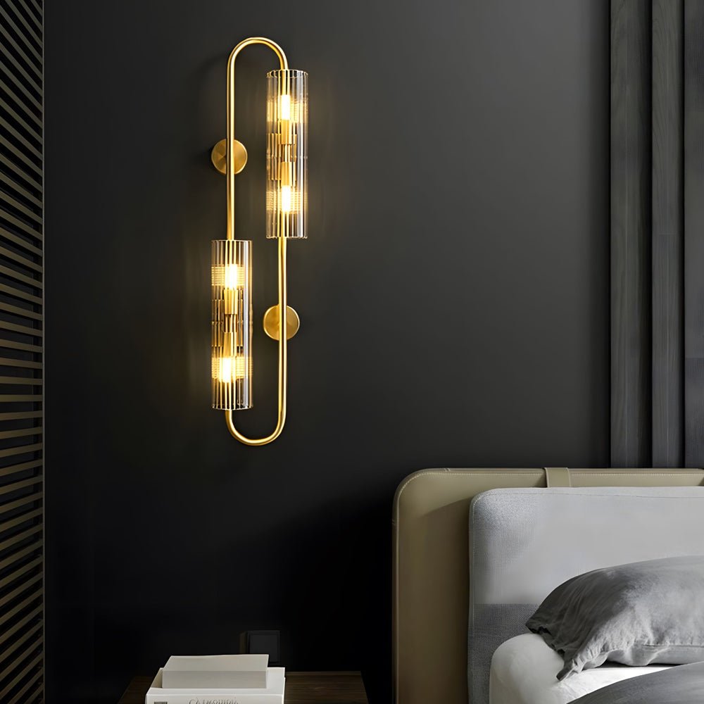 Elegant 4-Light Oval Brass Wall Sconce with Clear Glass Shade