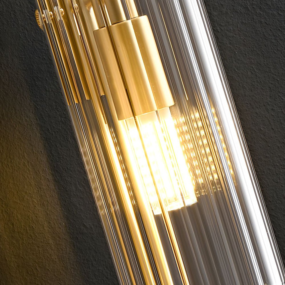 Elegant 4-Light Oval Brass Wall Sconce with Clear Glass Shade